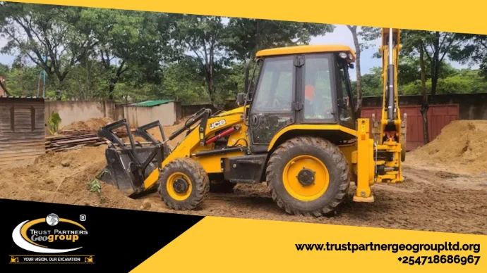 Heavy earthworks equipment in operation on a construction site in [Nairobi/Machakos/Kiambu/Nakuru], including excavators and dump trucks, performing trenching and grading with on-site safety measures