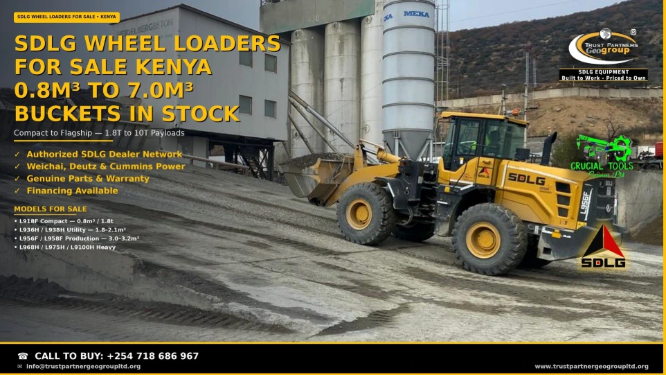 SDLG wheel loaders for sale in Kenya — a yellow SDLG L956F production-class wheel loader carrying an aggregate bucket at a concrete batching plant with cement silos and aggregate bays behind. Trust Partners Geo Group, sub-dealer partner of Crucial Tools Services Ltd, authorized SDLG dealer. Eight models from the 0.8m³ L918F compact to the 7.0m³ L9100H flagship, with Weichai, Deutz and Cummins power, genuine parts, warranty, and financing available. Call +254 718 686 967 to buy